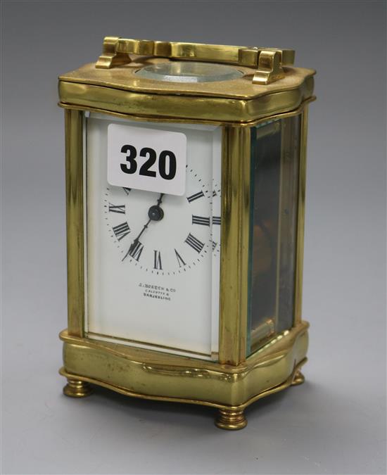 A brass carriage timepiece by Rosen and Co Calcutta height 12cm